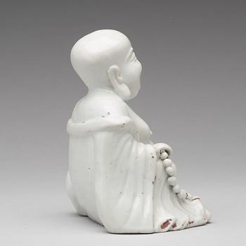 A blanc de chine figure of Buddai, Qing dynasty, 18th Century.