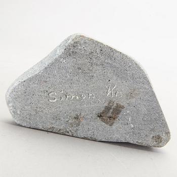 A simon Kristofferson signed stone figurine.