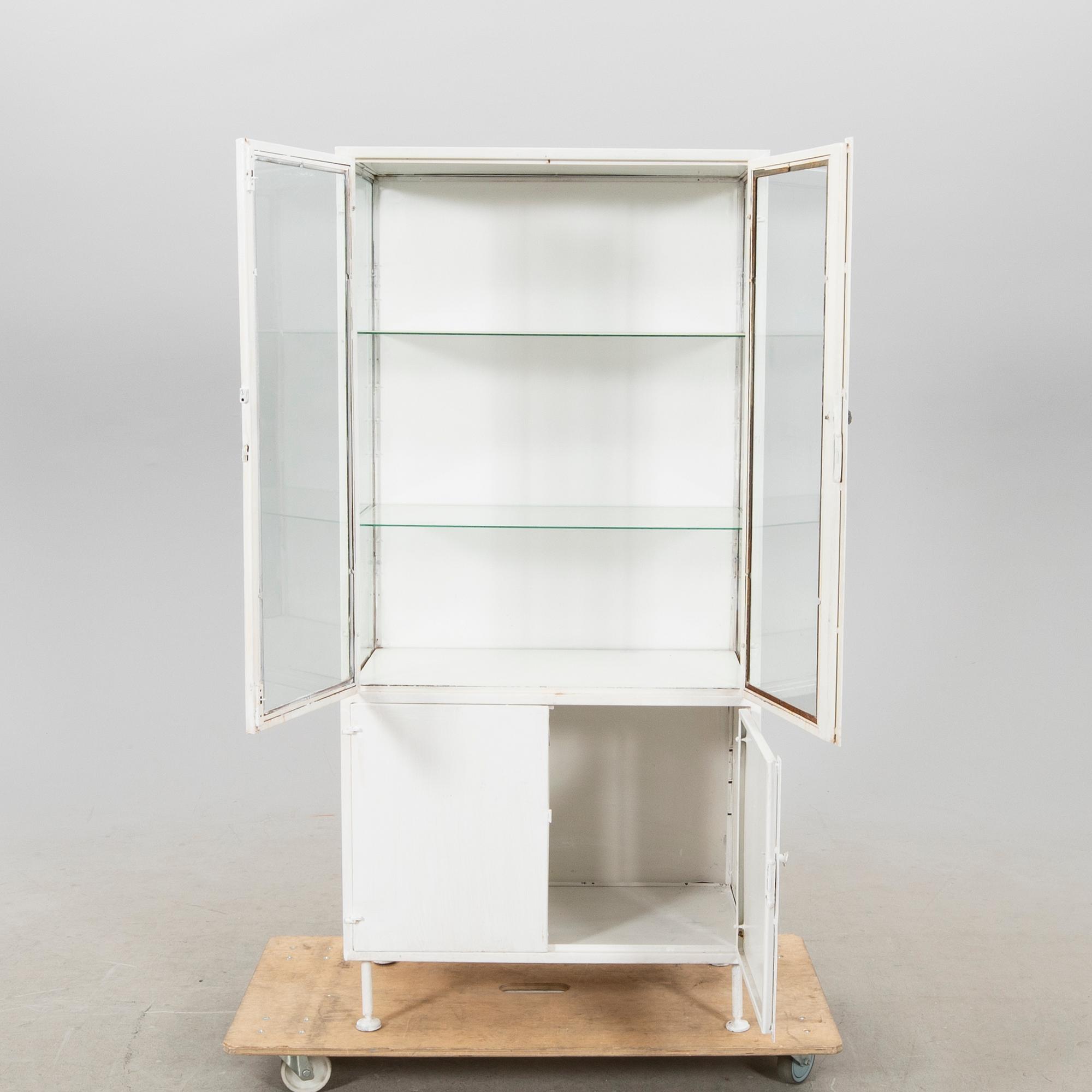 A mid 1900s metal medicine cabinet.