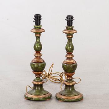 A pair of mid 20th century wood table lamps from Paoletti, Firenze Italy.