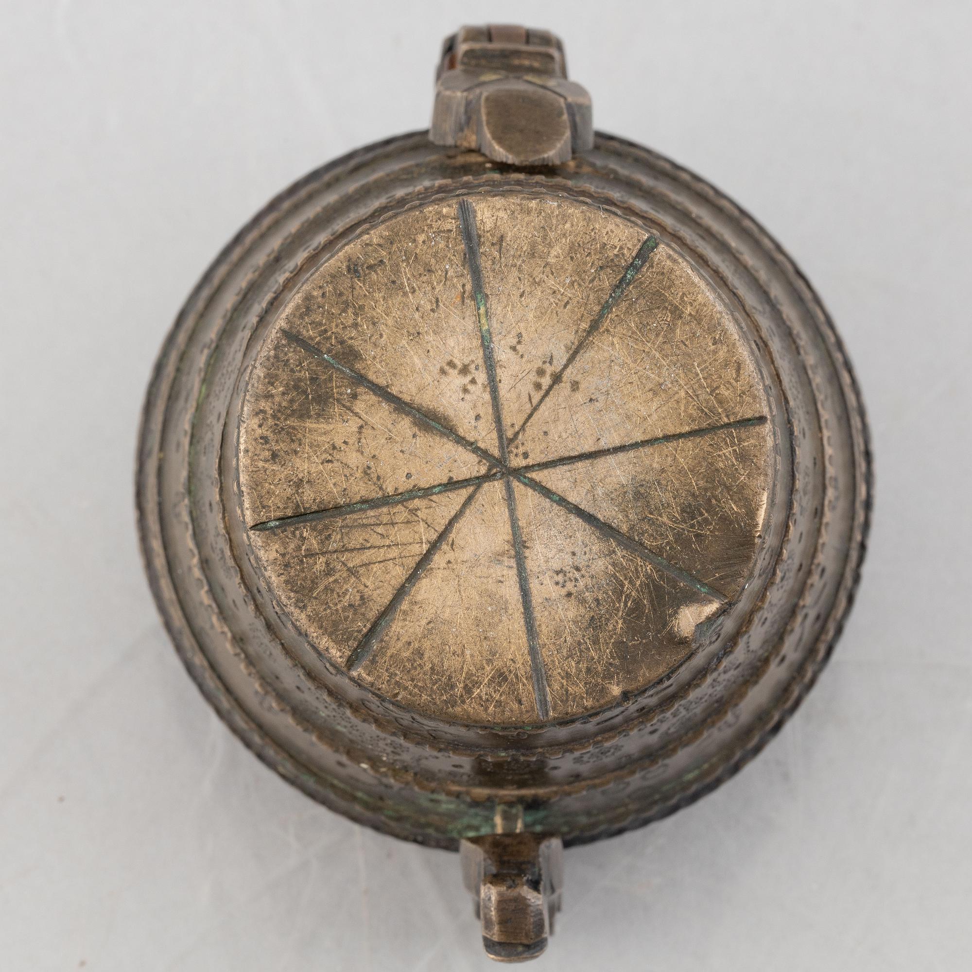A set of three Nuremberg brass nested cup weights, one by Christoph or Johan Conrad Schön (masters 1746(1750).