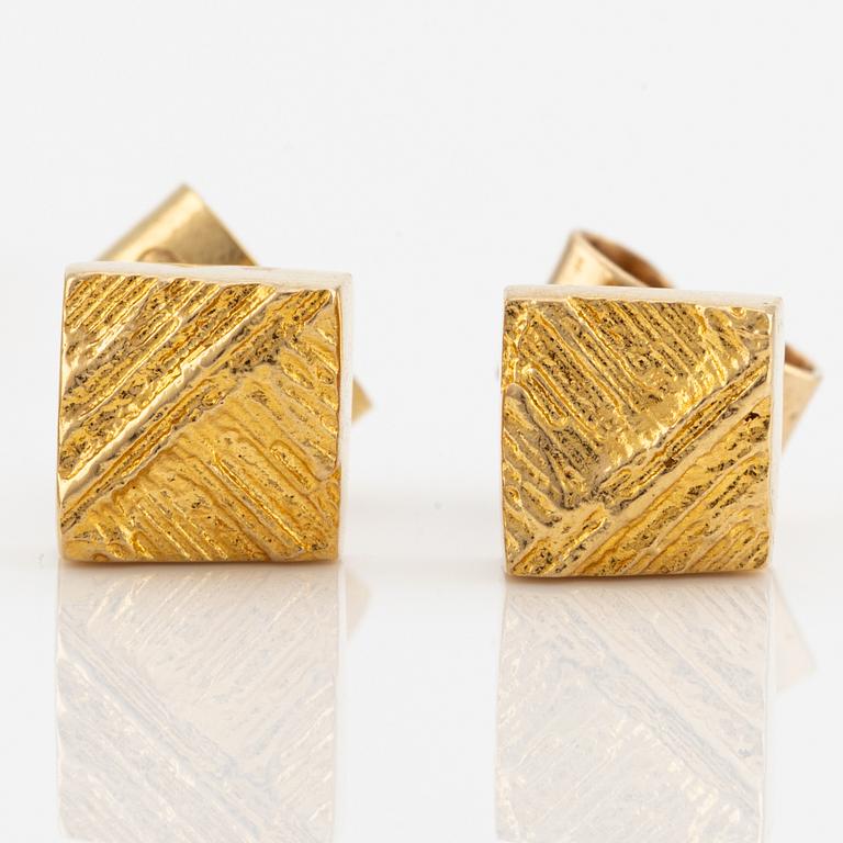 Lapponia, a bracelet and a pair of earrings, 18K gold.