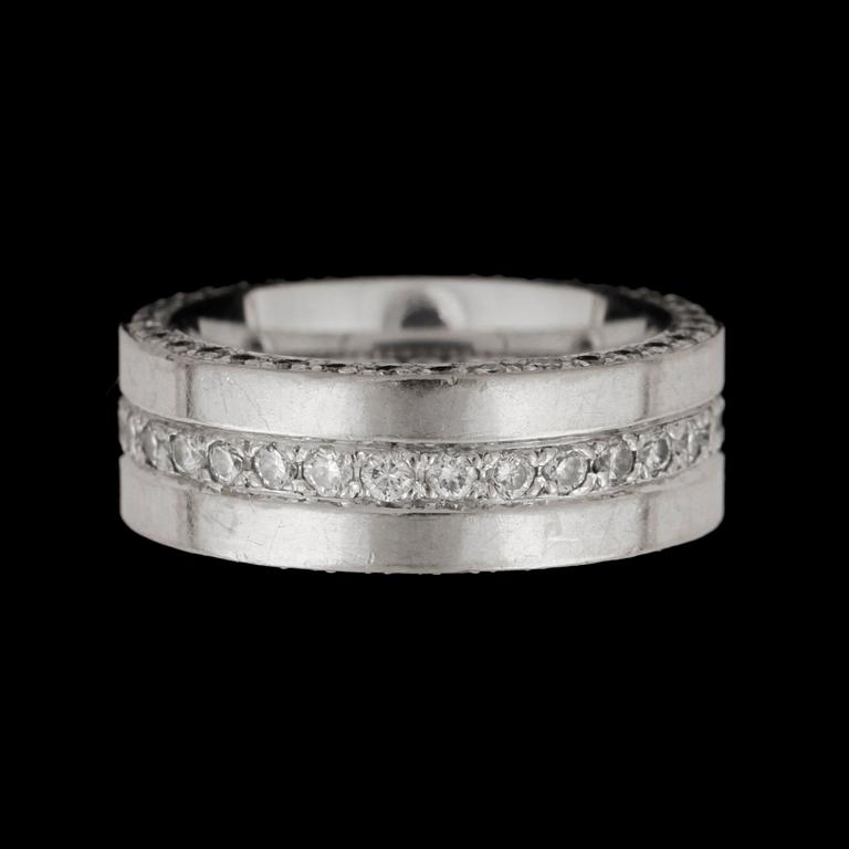 A brilliant-cut diamond eternity ring. Total carat weight circa 1.00 ct.