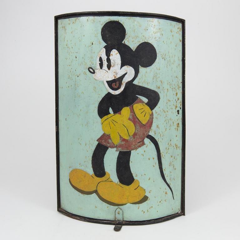 A metal Mickey Mouse fire screen, mid 1900s.