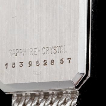 DAMARMBANDSUR, Certina, 18k vitguld med krans med åttkantsslipade diamanter tot 0,20ca. Tot vikt 28g.