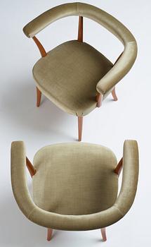 Josef Frank, a pair of mahogany horseshoe chairs, Svenskt Tenn, Sweden, mid 20th Century, model 966.