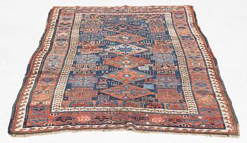 An antique Kurdish / Turkish carpet by the Herki Tribe, c 233 x 137 cm.