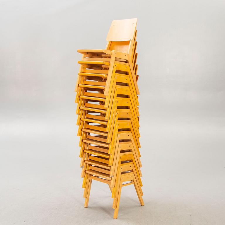 A set of 12 beech stackable chairs mid 1900s.