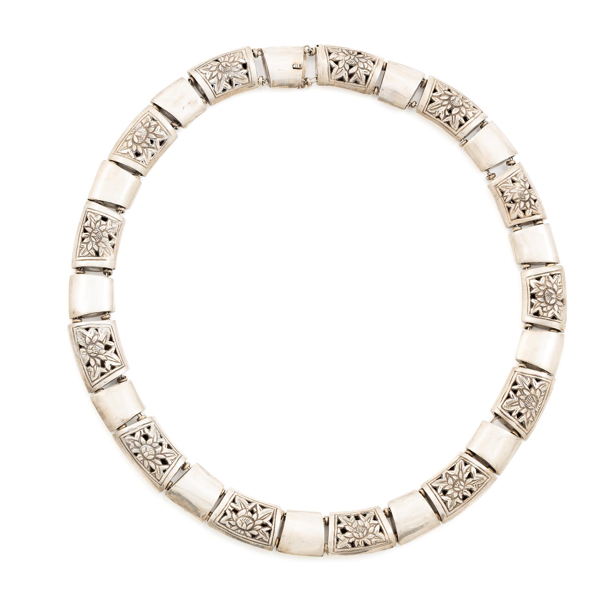 Silver necklace.