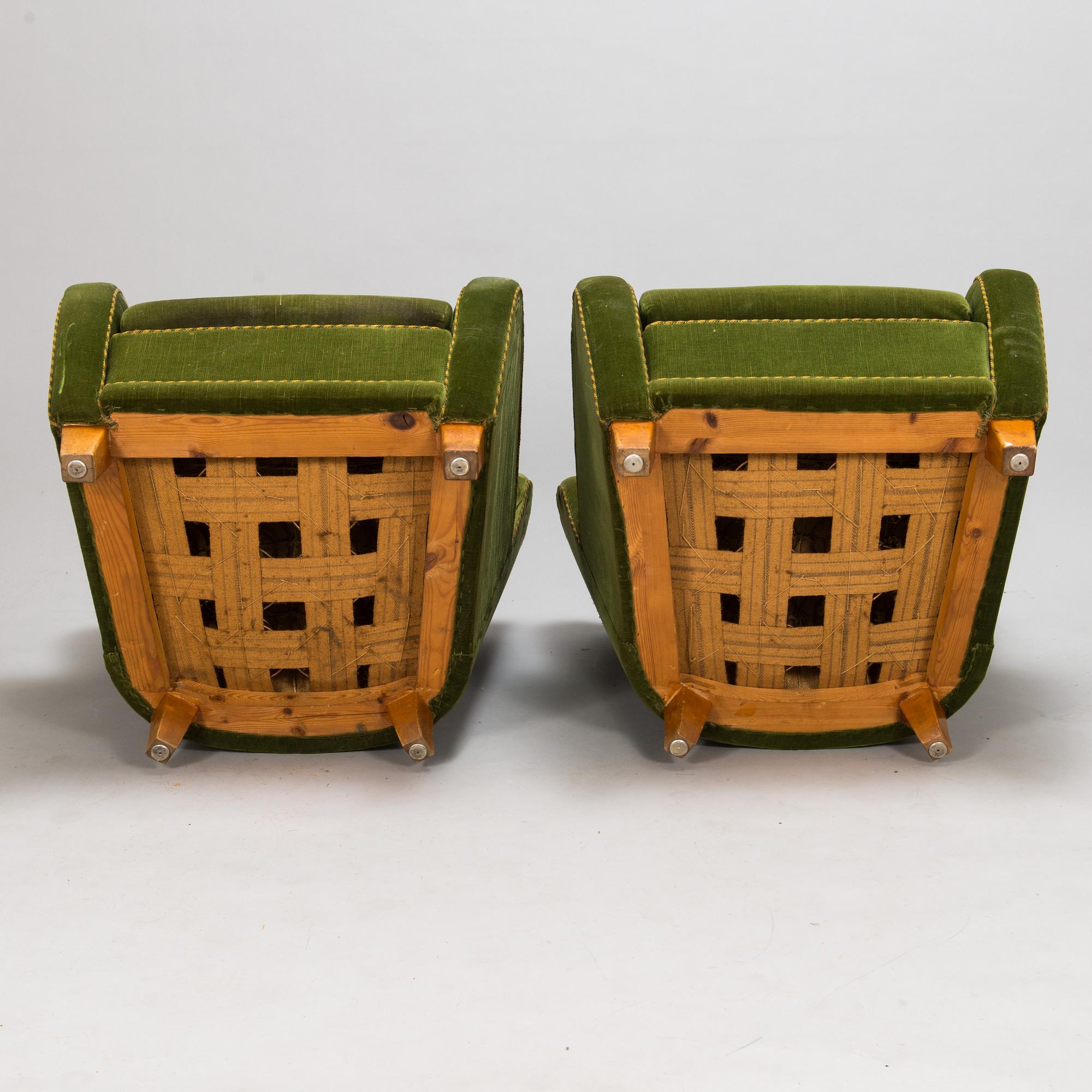 A pair of 1950s armchairs.