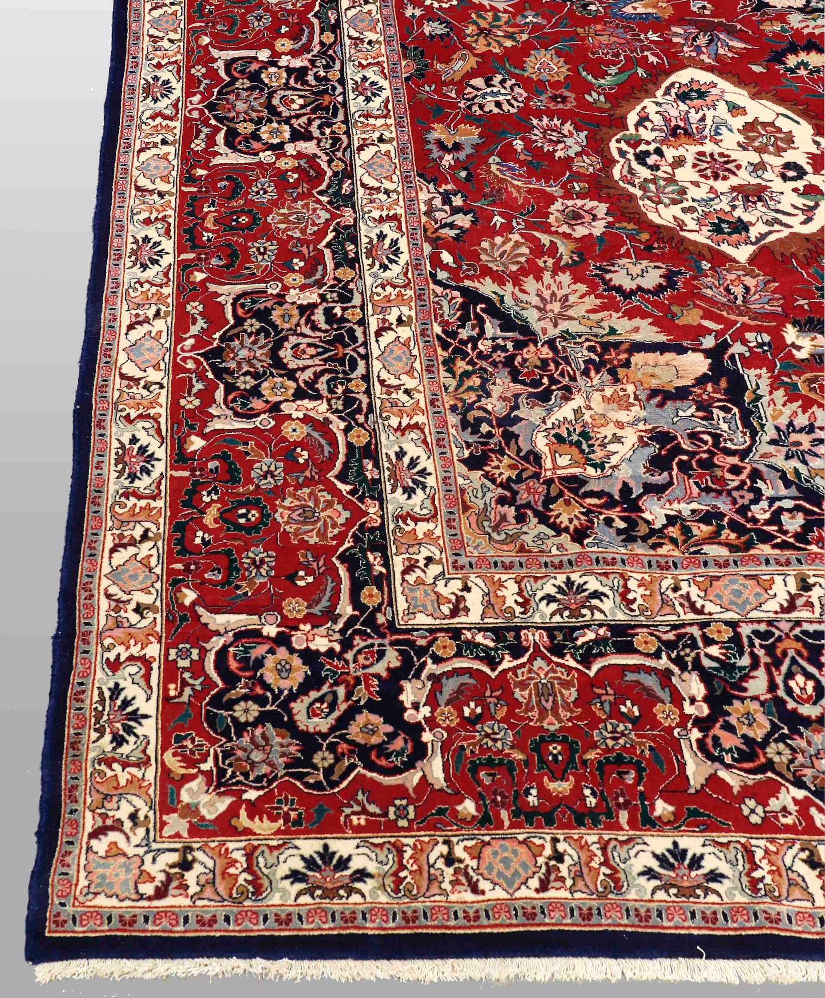 A CARPET, Tabriz, possibly, part silk, ca 417 x 300 cm.