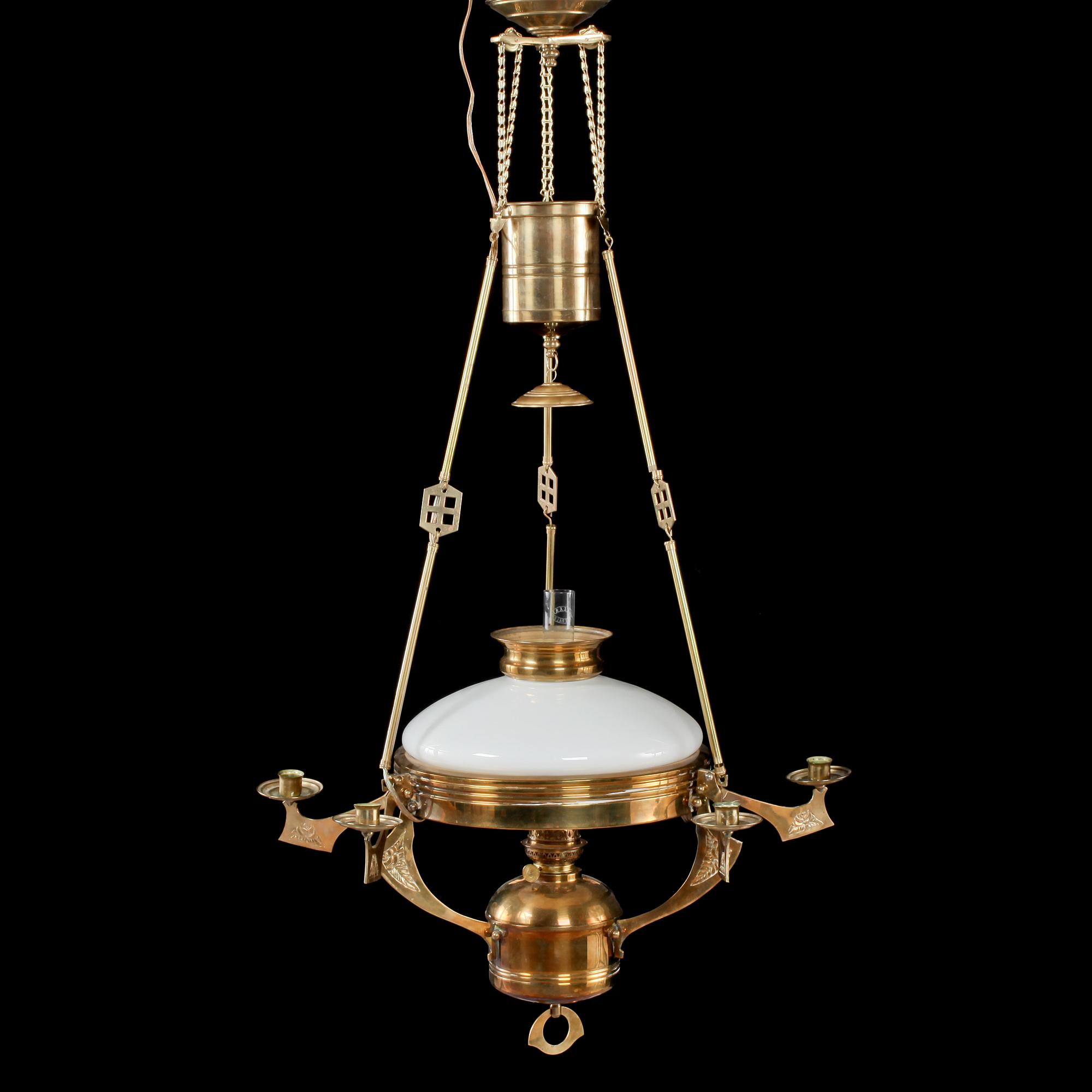 TAKFOTOGENLAMPA, jugend, 1900-talets första kvartal.