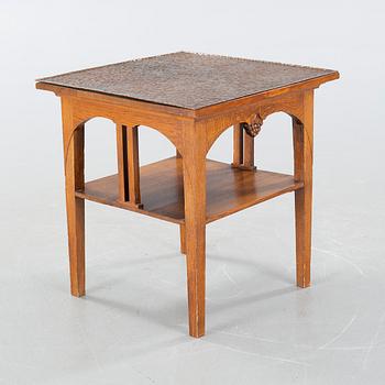 CARL CHRISTIAN CHRISTENSEN, a jugend smoking table, signed and dated 1910.