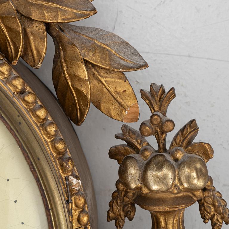 A Gustavian wall clock signed by Jacob Koch (active in Stockholm, 1762-1805).