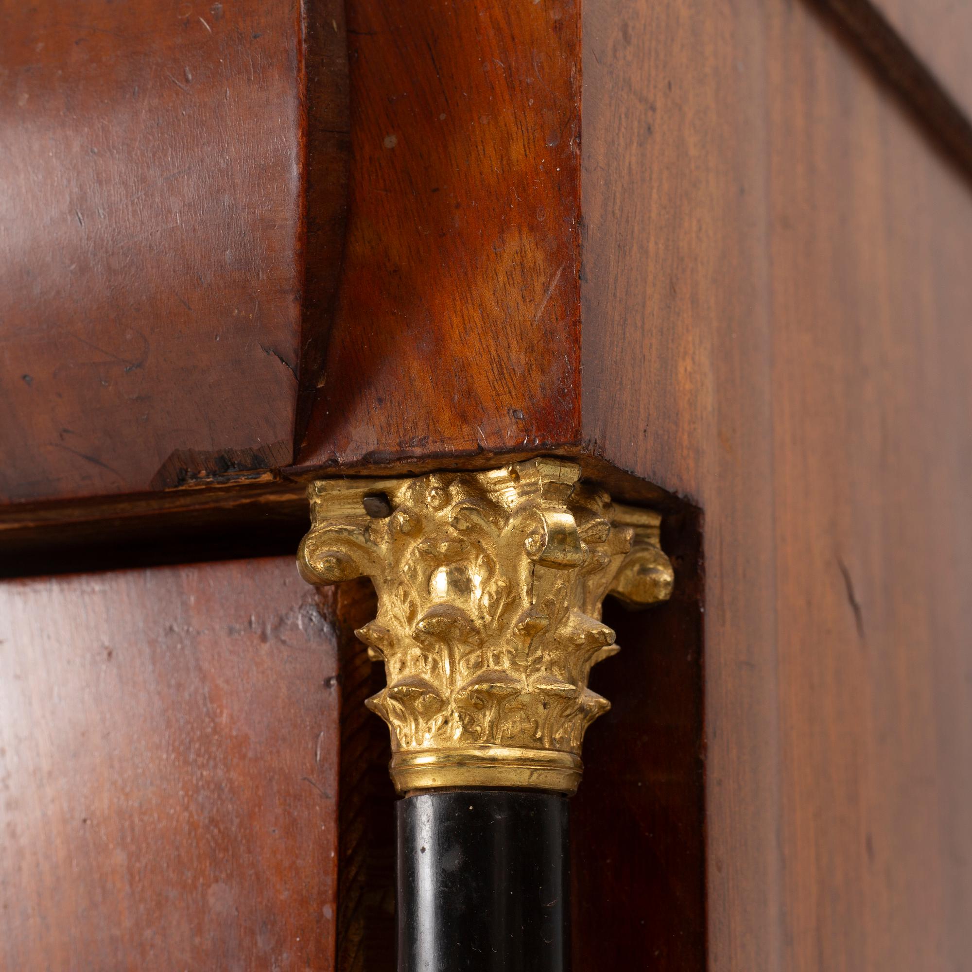 An Empire chest of drawers, first half of the/mid 19th century.