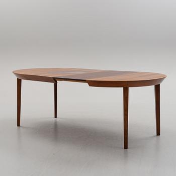 A 1950s/1960s rosewood veneer table.