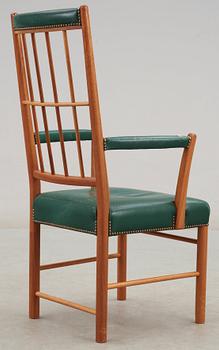 A Josef Frank mahogany and green leather armchair, Svenskt Tenn, model 652.