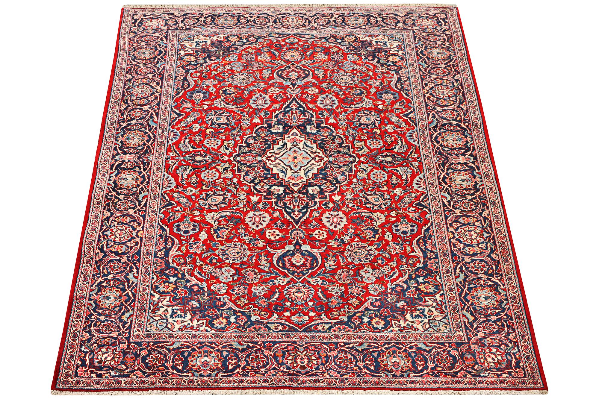 A KAshan rug, a. 214 x 139 cm.