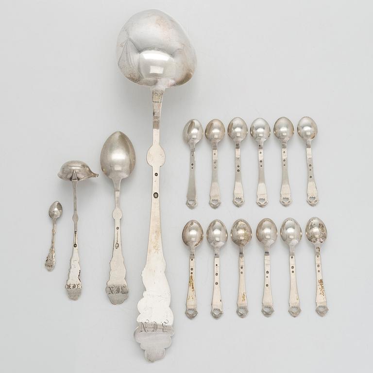 A set of  four silver serving spoons, with a set of 12 coffee spoons, Denmark, early and first half of the 20th century.
