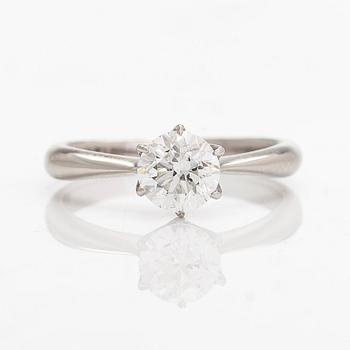 A platinum ring, with a brilliant-cut diamond approximately 1.00 ct according to the engraving.