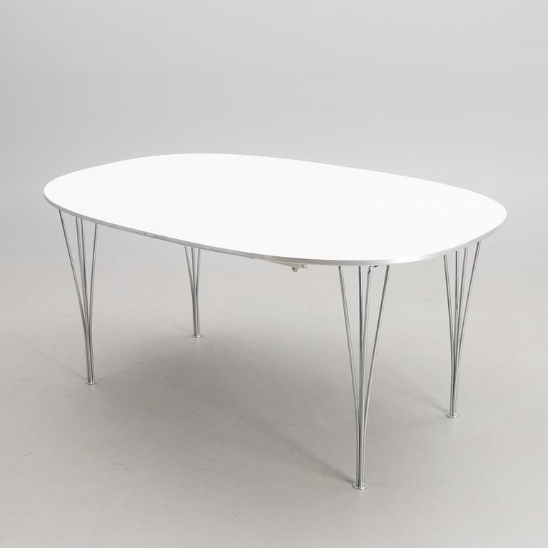 BRUNO MATHSSON AND PIET HEIN, a 'Superellips' dining table from Fritz Hansen, 1993.