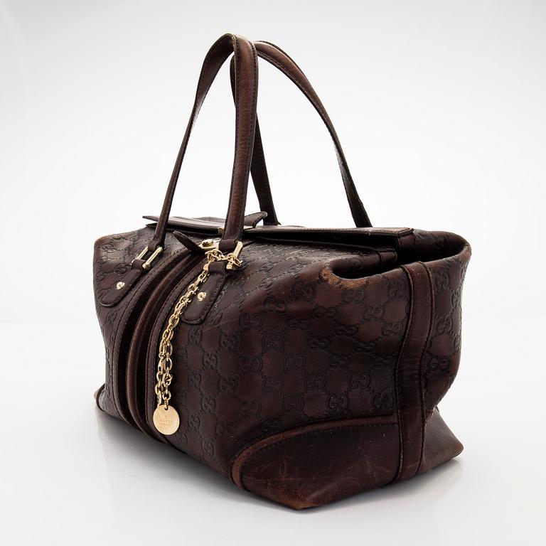 Gucci, A 'Boston' bag.