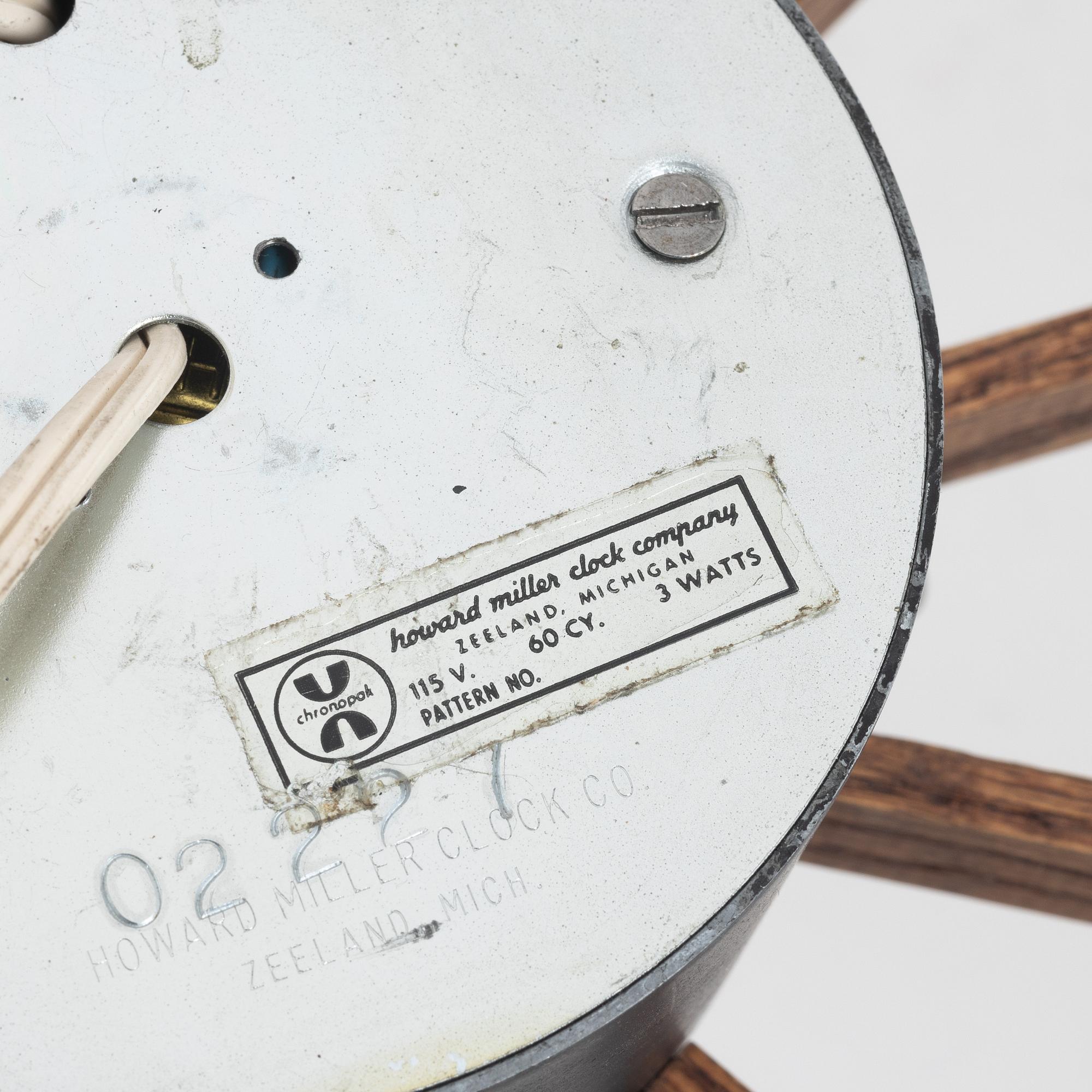 George Nelson, a 1960's spoke wall clock, model 2227, for Howard Miller. USA.