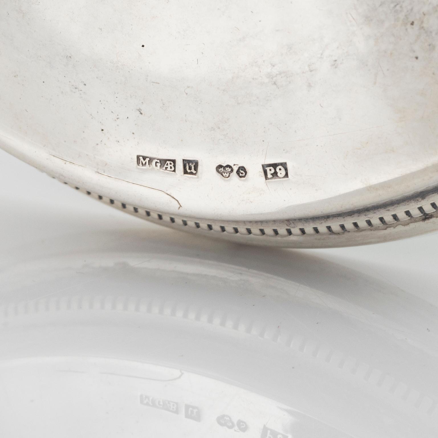 A pair of silver candle sticks, MGAB, Uppsala, Sweden, 1965.