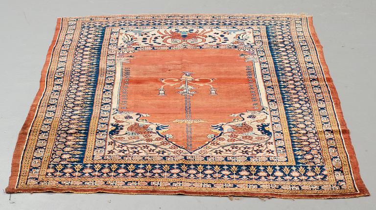 Matto, an antique silk Heriz, ca 166,5-170 cm x 116-120 cm.