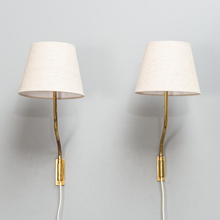 Lisa Johansson-Pape, Two mid-20th century '3053' wall lights for Stockmann Orno.
