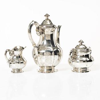 A silver coffee pot, cream jug and sugar bowl, Swedish import mark of CG Hallberg, Stockholm 1927.