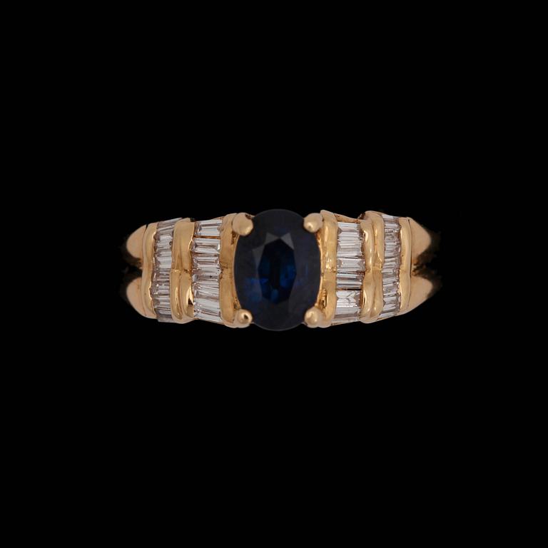A blue sapphire ring, app. 1.60 ct. set with brilliant cut diamonds, tot. app. 0.40 ct.