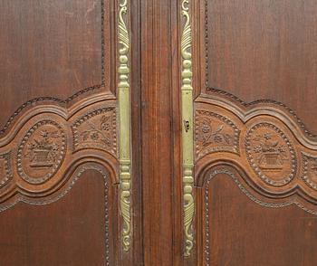 A french carved wooden cabinet, around 1900.