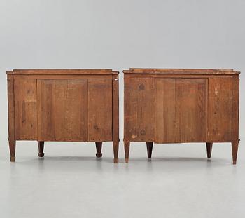 A matched pair of Russian Neoclassical Commodes, St Petersburg, circa 1800.