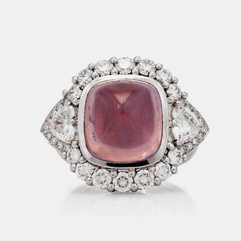 An unheated pink sapphire and diamond ring.