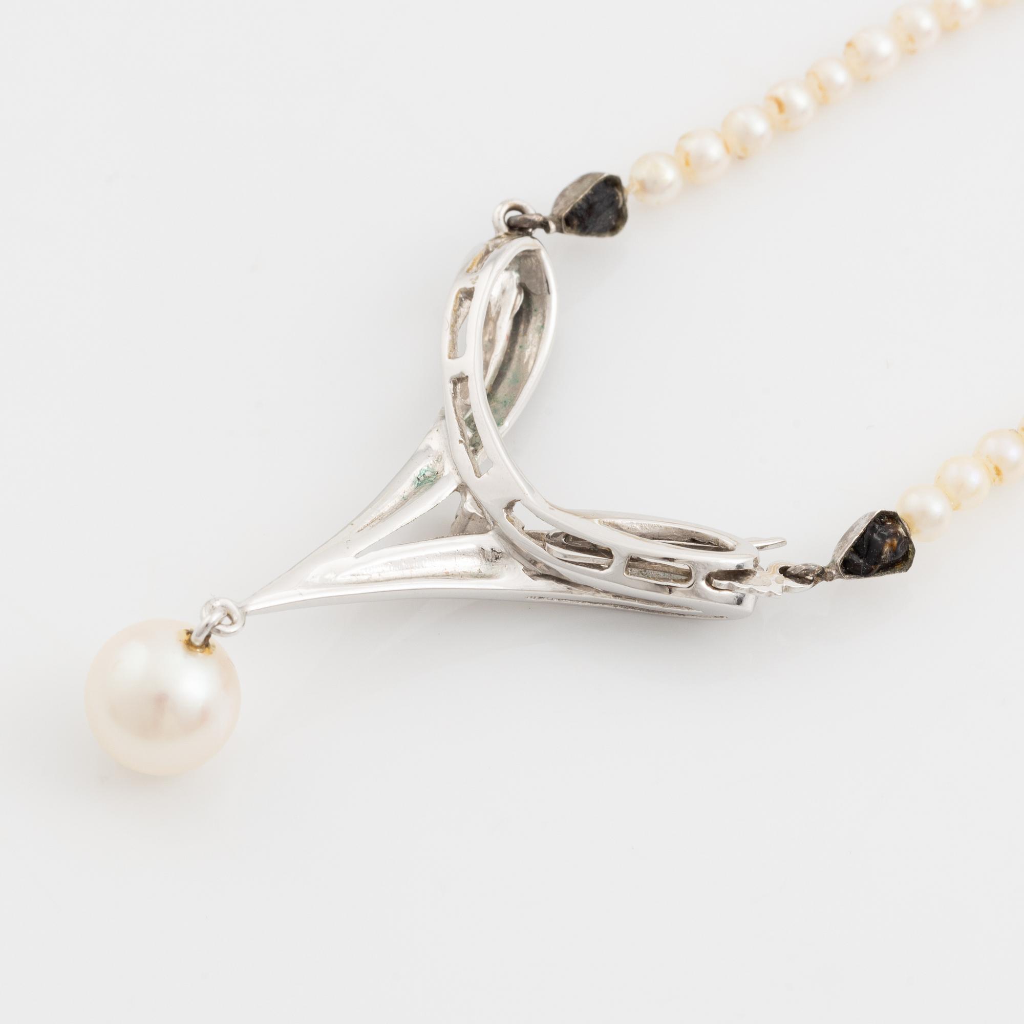 Necklace and earrings, a pair, cultured pearls, white gold, and brilliant- and octagon-cut diamonds.
