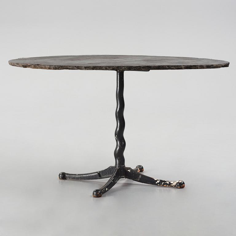 Josef Frank, attributed to, a cast iron base table for Firma Svenskt Tenn, Sweden 1930s-40s.