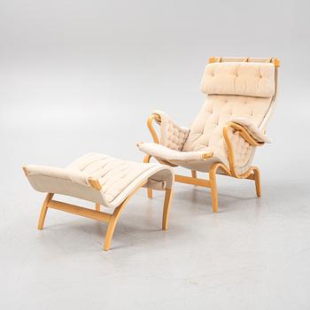 Bruno Mathsson, a 'Pernilla' easy chair and footrest by DUX.