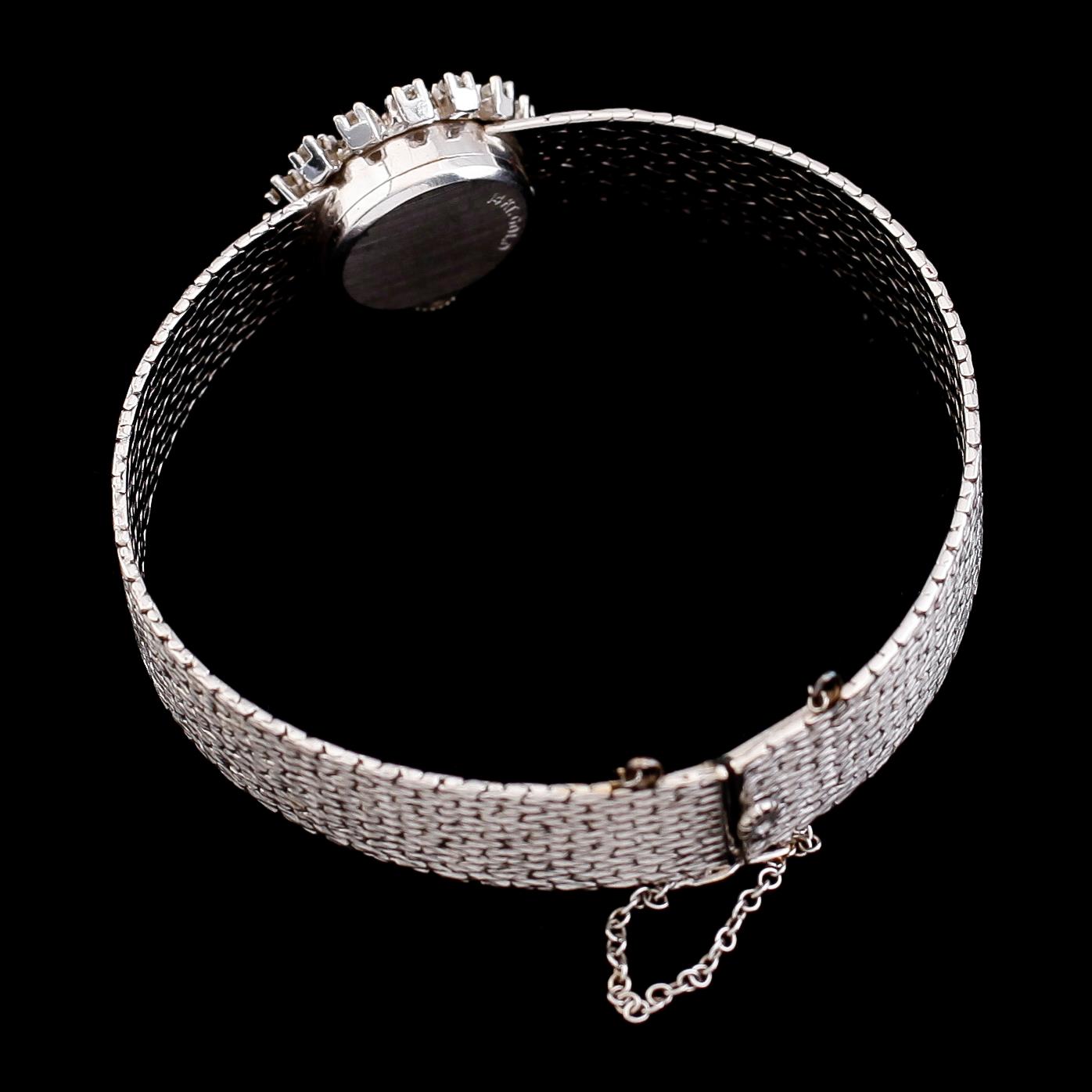 ARMBANDSUR, 14 k vitguld, briljantslipade diamanter. Vikt ca 30,2 g.
