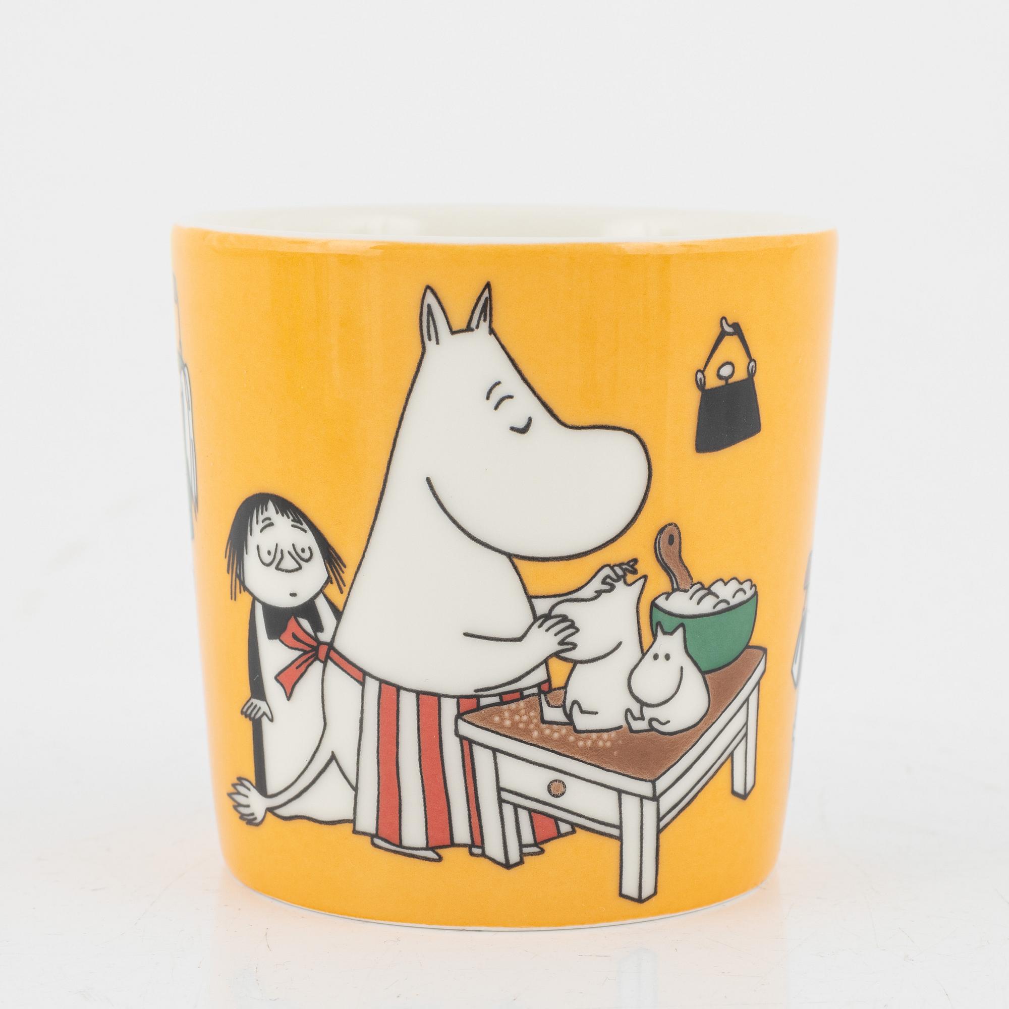 Eleven porcelain Moomin mugs, Arabia, Finland.