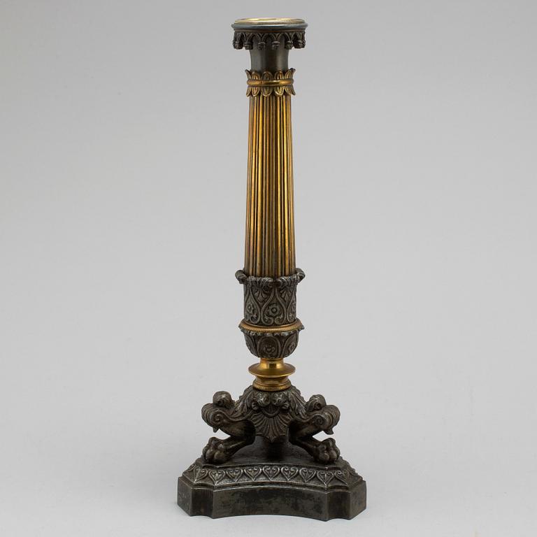 A mid 19th century late empire candlestick.