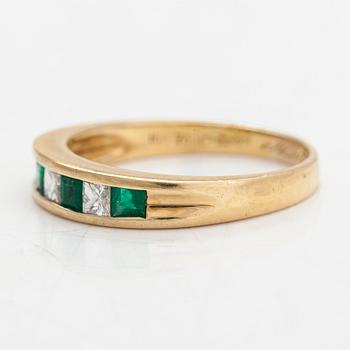 An 18K gold ring, set with emeralds and princess-cut diamonds totalling approx. 0.34 ct. Finnish import hallmarks.