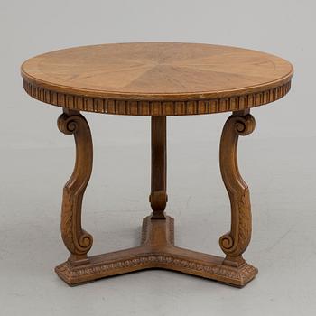 An  oak veneered table form Nordiska Kompaniet, 1938.