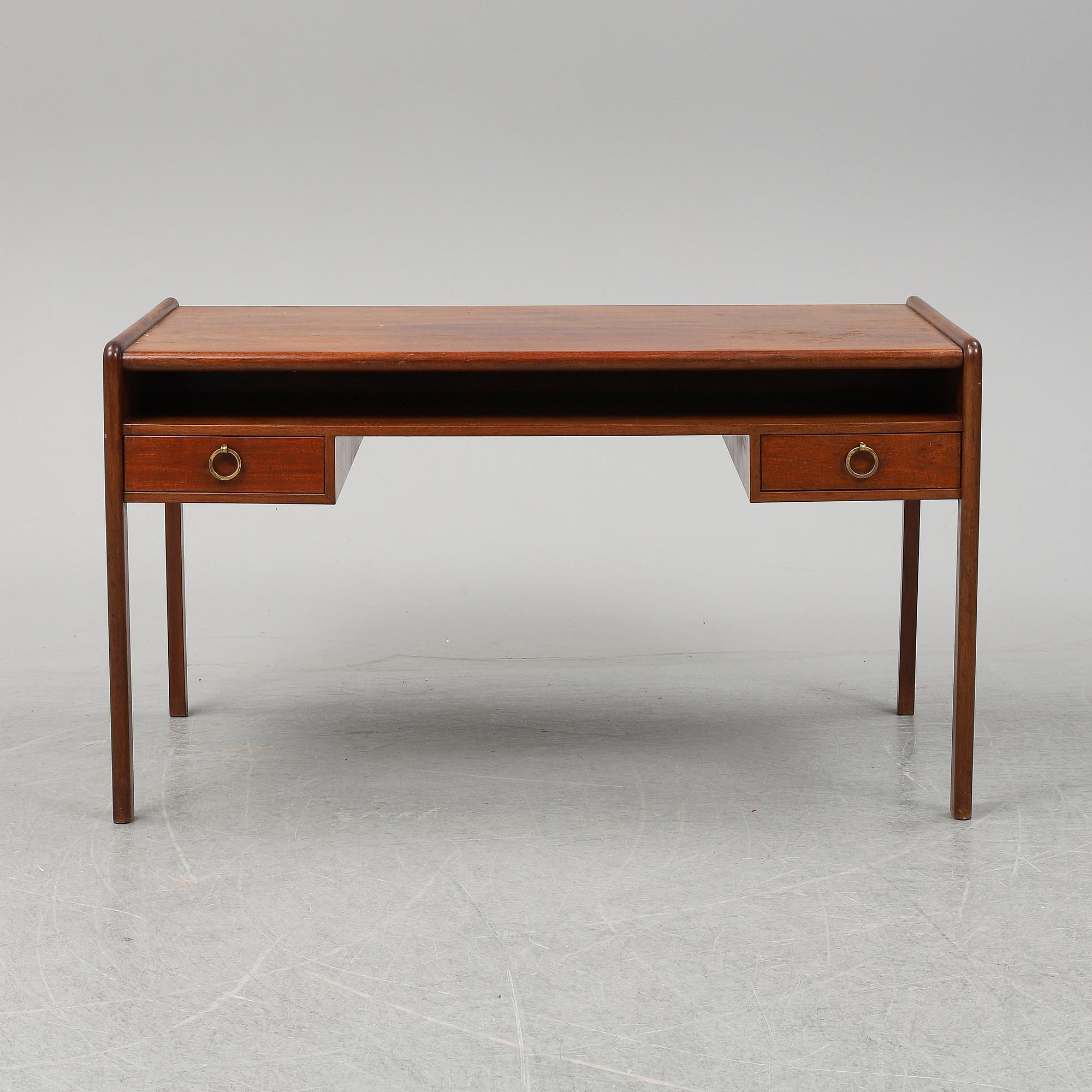 A mahogany desk, mid 20th Century.