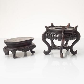 A group of Chinese hardwood stands and a cover, Qing dynasty and later.
