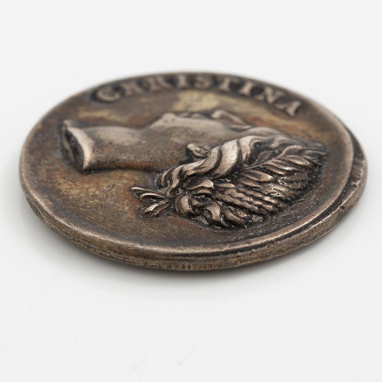 A coin commemorating Christina of Sweden's coronation 1650, by Erich Parise (medal engraver, fl. mid 17th century).