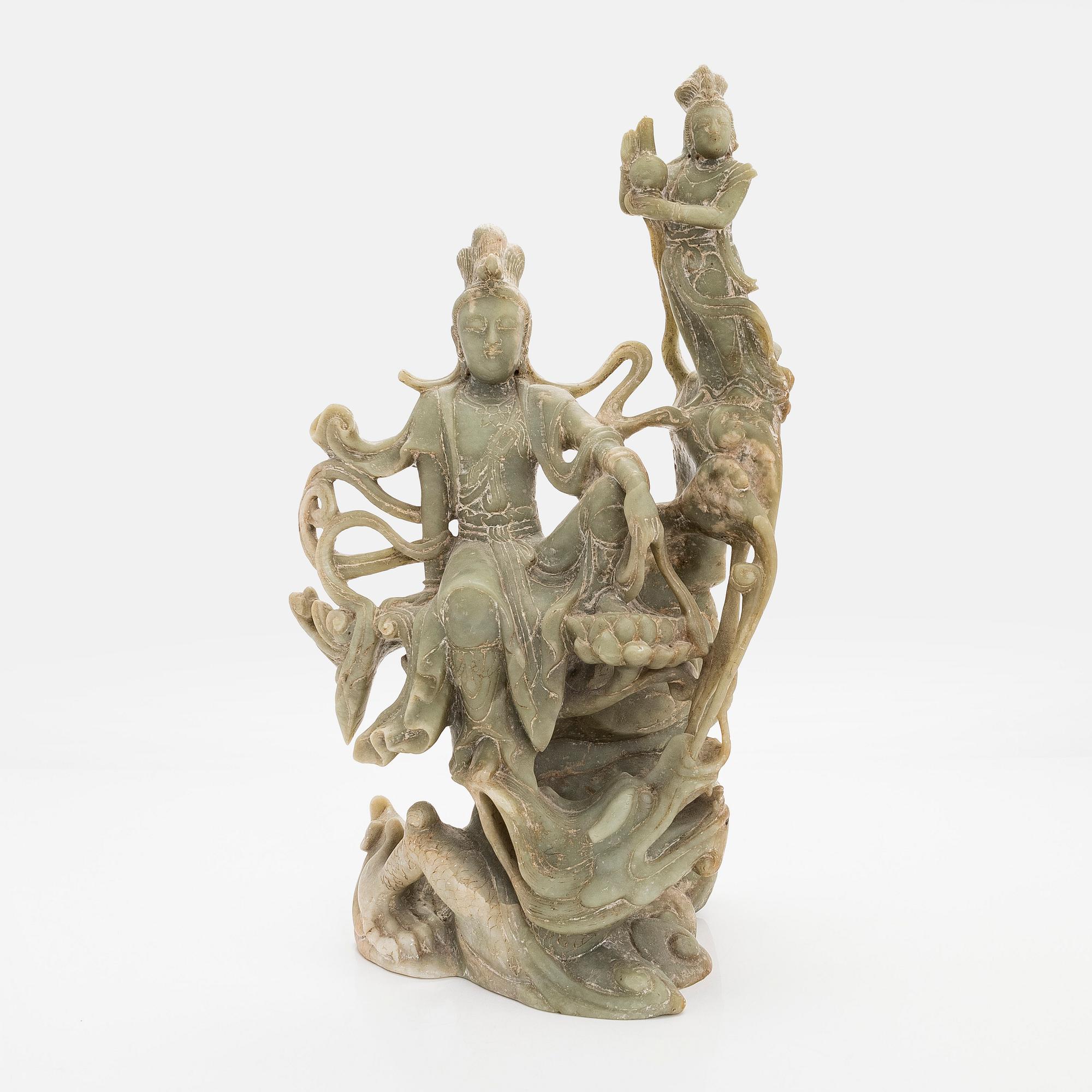 A large soapstone sculpture group of Guanyin, 20th century.