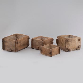 Four handcrafted wooden tins, 19th century.