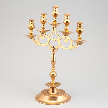 A pair of brass baroque style candelabra, early 20th century.