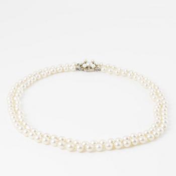 Necklace, cultured pearls, clasp 18K gold with cultured pearls and diamonds, JSG, Jönköping 1979.